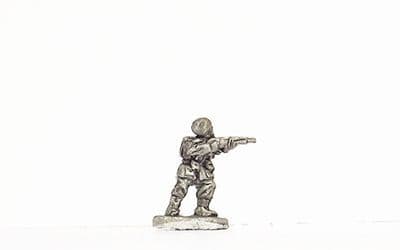 Commando, standing, firing rifle
