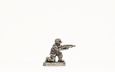 Kneeling, firing rifle